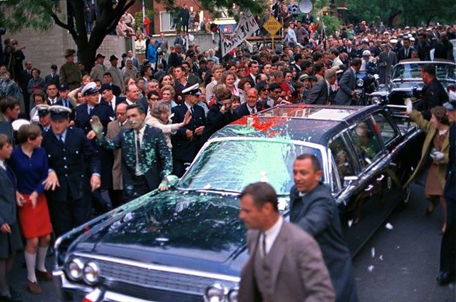 #Lyndon Johnson's presidential limousine is bombarded with balloons of paint in the colours of the flag of the Viet Cong by two young brothers protesting the Vietnam War during a state visit to Australia, October 21, 1966 [960x636] #history #retro #vintag