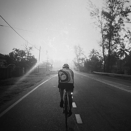 #sky is the limit. #blackwhite #blackandwhite #blackwhitephoto #iphonephoto #iphonecamera #iphonephotography #instahub #insta_bnw #instagram #bnw_lover #bnw #cycling #riders #landscape #malaysia #colnago #kelantan #flare | by cationng
