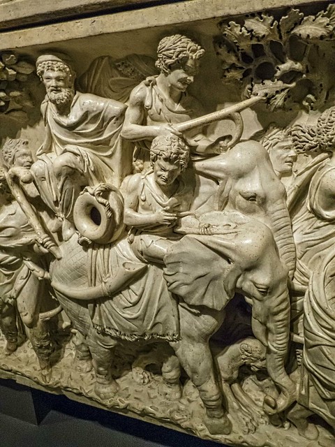 Satyrs, elephants and panthers on a Roman sarcophagus depicting the triumphal procession of Dionysus through India with his attendants riding elephants and lions 190 CE