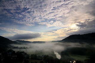 Misty valley sunrise