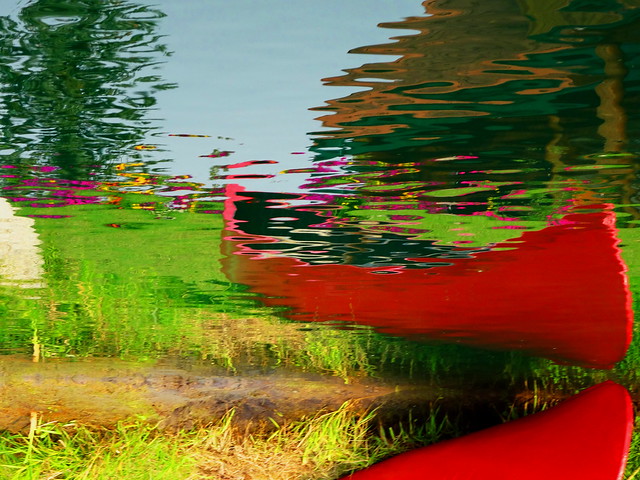 Water Art: Flipped canoe and flower garden lake reflections