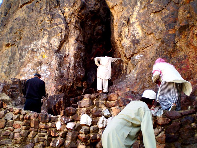 Pilgrims visit the cave of uhud