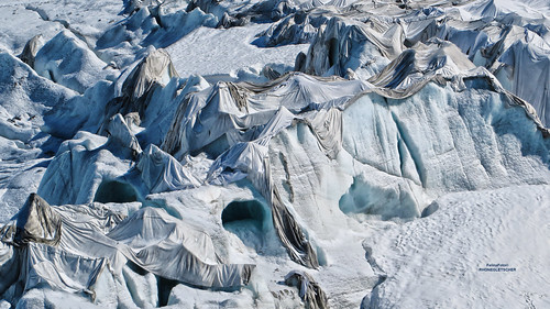 Blankets cover Swiss glacier in vain effort to halt icemelt