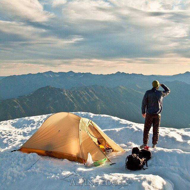 #tbt to that time Aaron and I camped on the summit of Joffre Peak a few years back.  It wasn't until our descent that we realized just how corniced this block of snow was!   #outdoorsupply #outdoorvancouver #ourcamplife #camping #summit #joffre #adventure
