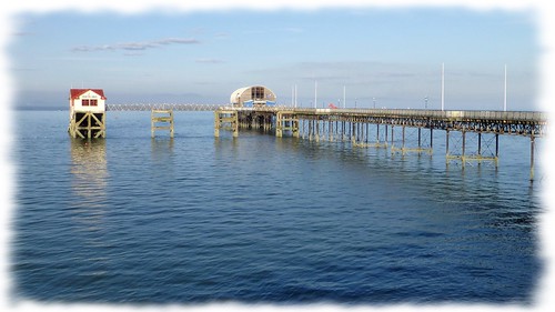 sea seascape building water architecture landscape coast pier serene mumbles tranquil