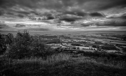 Sunset at Walberla BW by MichaelAschke, Bad weather "golden hour" at Walberla, near Forchheim. The sun found a gap in the clouds, 
