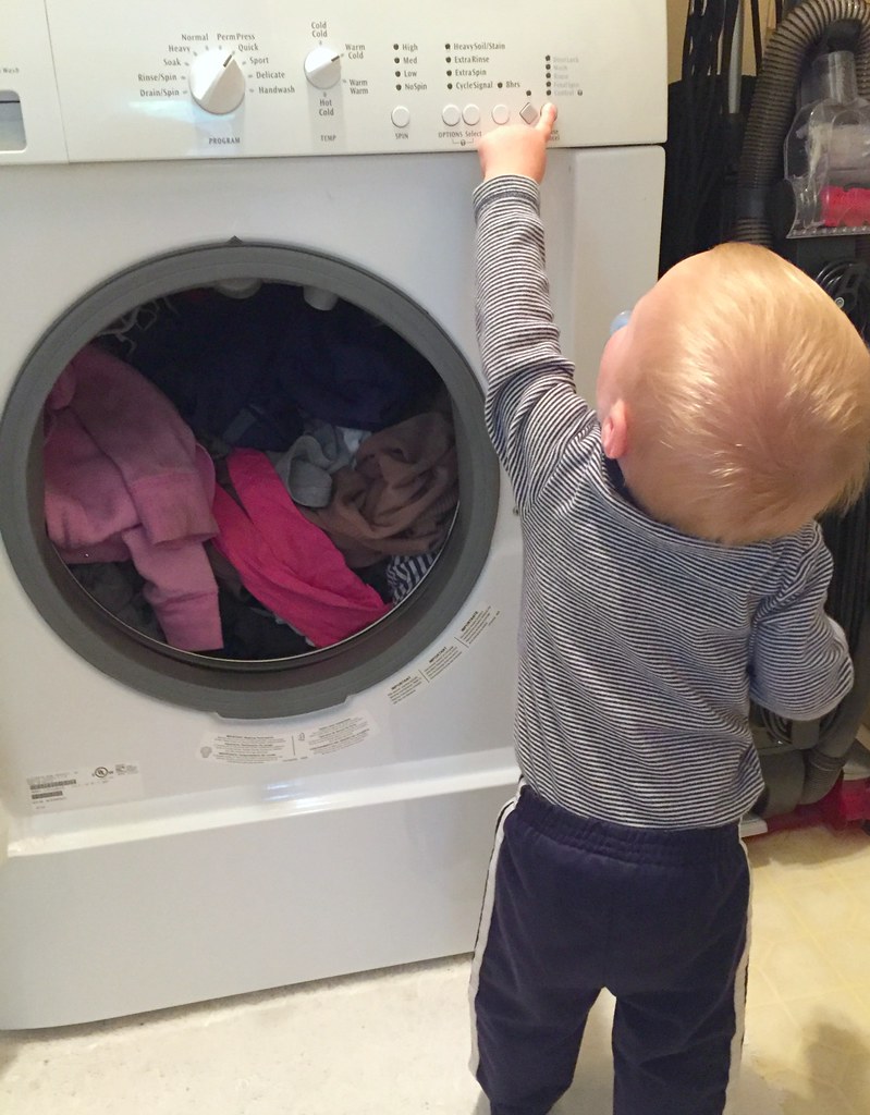 child doing the laundry 