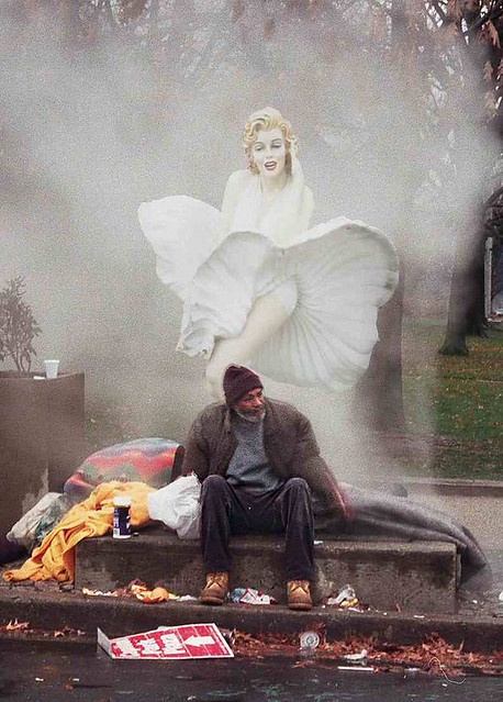 Homeless Man and Marilyn Monroe Keeping Warm on a Steam Vent in Washington, DC
