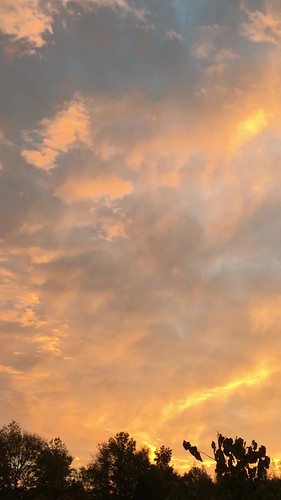 sunrise orange yellow blue sky clouds