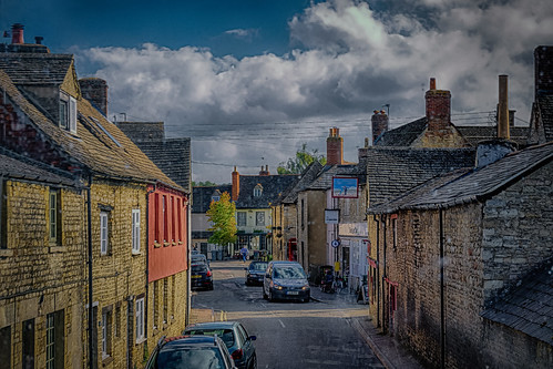 road street old windows light sky sun sunlight signs color colour window glass car sunshine skyline clouds vintage countryside town shadows antique traditional rustic historic roofs shops colourful picturesque chimneys hhouses ttraffic