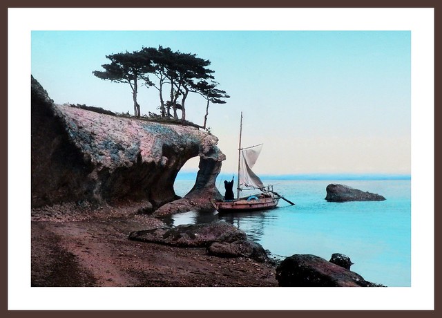 A BOATMAN HOISTS HIS SAIL ALONG THE SCULPTED SHORES OF MATSUSHIMA in OLD JAPAN