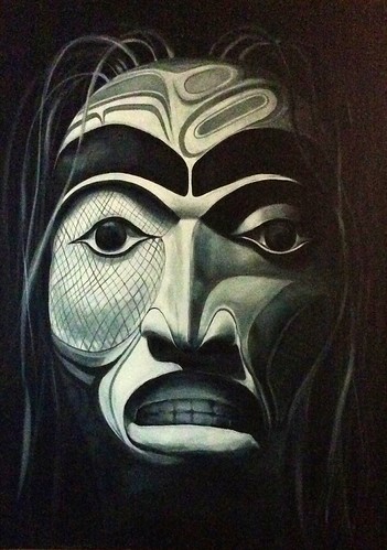 Black and white mask face with curved lines