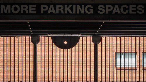 More Parking Spaces | The metal mesh and iron bars of a carp… | Flickr