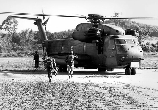 #During the final US combat of the Vietnam War, a USAF pararescueman of the 40th Aerospace Rescue and Recovery Squadron (in wet suit) and a Marine run for an HH-53C 