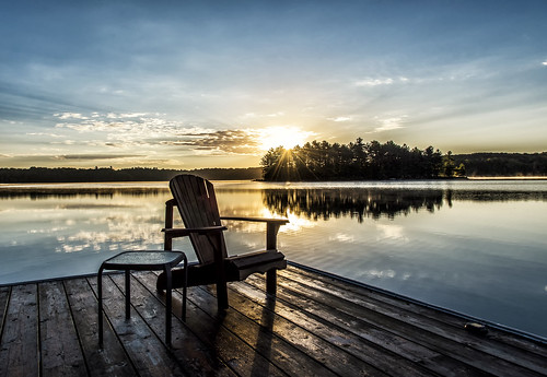 canada ontario muskoka lake chair dock water sunrise sun reflection island trees sky blue fog calm outdoor north america relax czphoto