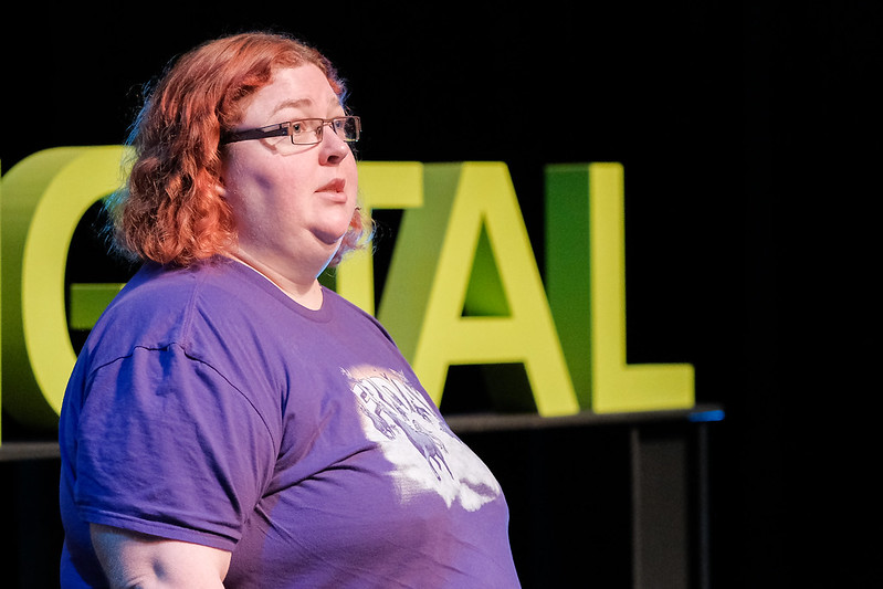 Meri Williams, a woman with short red hair and glasses, talking at 'Thinking Digital Women' conference in 2016
