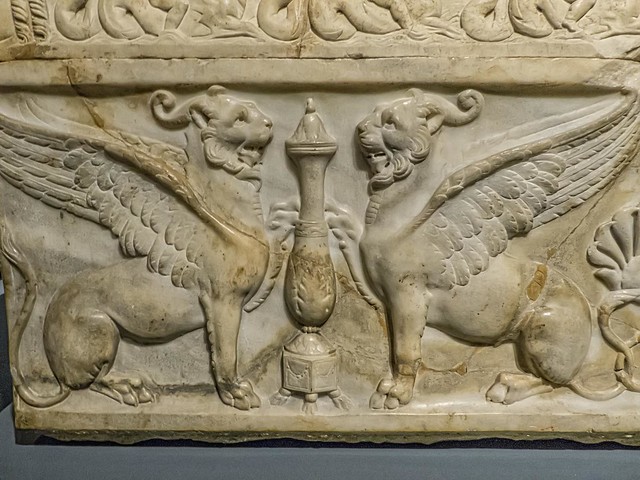 Closeup of panther-griffins and the vase-like object that symbolizes deification in the cult of Dionysus Sabazius on Roman sarcophagus 150-170 CE