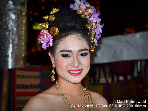night dancer beautiful travel tourism blue gold beautifuleyes ethnic posing makeup cultural character female gorgeous lips portrait nightmarket smiling beauty girl primelens lipstick street eyes asia flash matthahnewaldphotography face facingtheworld chiangrai wreath hairjewelry horizontal jewelry nikond3100 outdoor thai flower 50mm expression northern nikkorafs50mmf18g threequarterview colour colourful person closeup consensual lookingatcamera