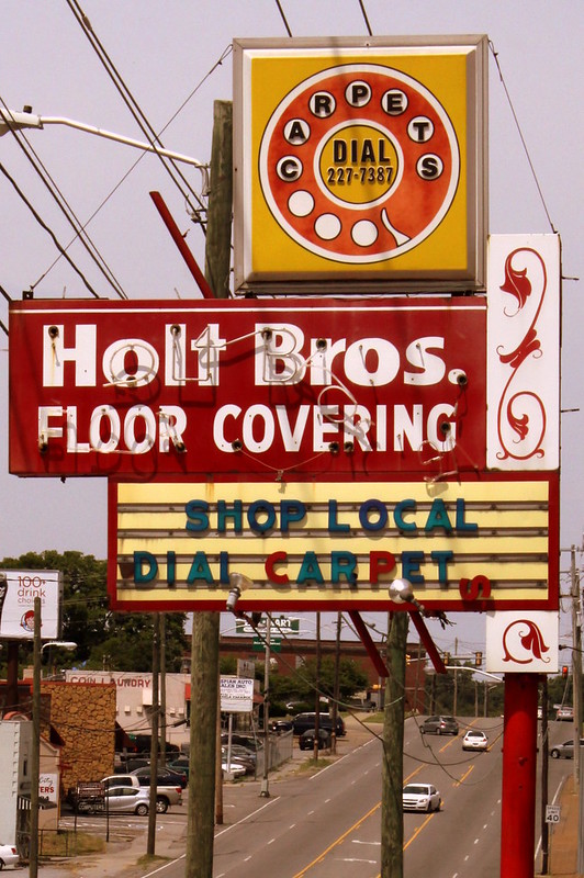Holt Bros. Floor Covering neon sign