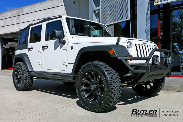 Jeep Wrangler with 20in Black Rhino Sidewinder Wheels and Lexani Mud Beast Tires with Rough Country Level Kit