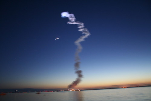 night sunrise space smoke nasa shuttle launch discovery 131 sts