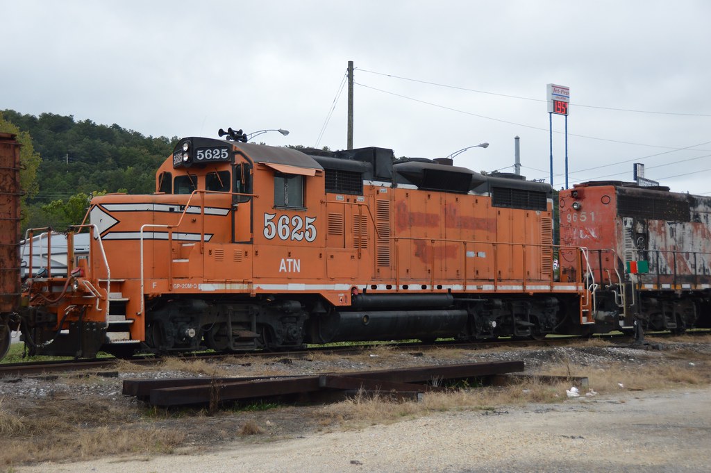 ATN 5625 rolls by at the home of some low gasoline prices , Attalla Alabama