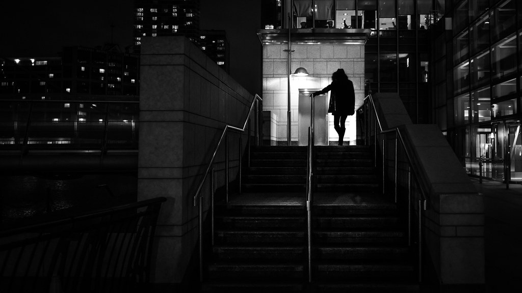Girl going home at night - London, England - Black and white street photography