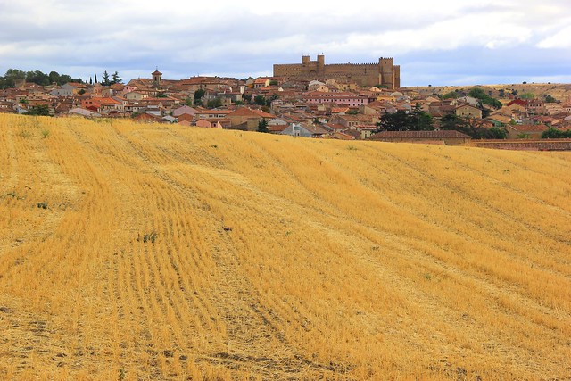 Siquenza castle in Spain across the fields