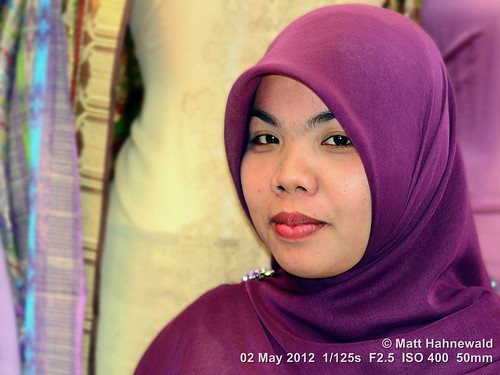 beauty hijab travel smiling ethnic posing street psychological primelens indoor cultural character woman female beautiful respect beautifuleyes attractive cheerful eyes matthahnewaldphotography face facingtheworld bukittinggi portrait head indonesia indonesian islam sumatra 50mm equity impact expression headshot lifestyle 1200x900pixels resized colour colourful person 4x3ratio closeup consensual lookingatcamera