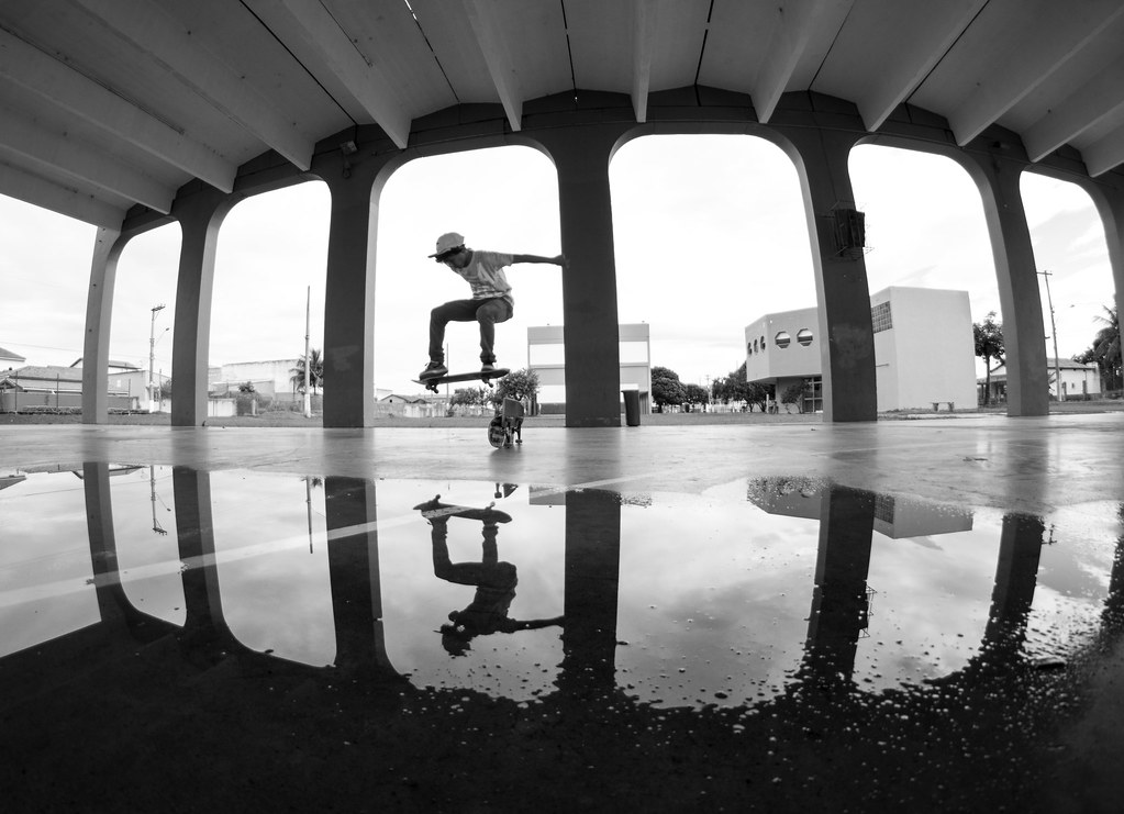 Ravi ollie reflecting on the water B&W