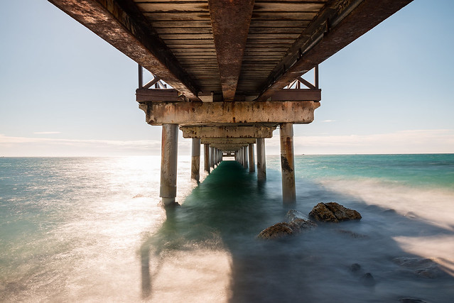 Under the jetty in Marbella at midday