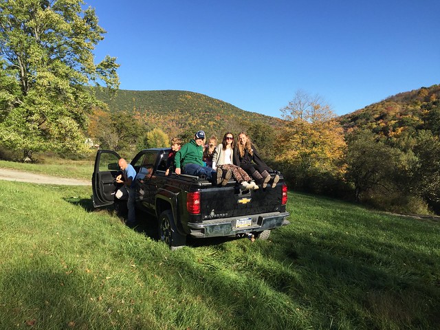 Group of Friends on a DiamondBack Truck Cover