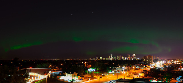 Northern lights over Calgary skyline.