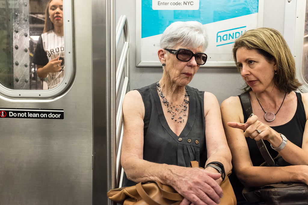 New York City Street Scenes - Two Women Talking on a Subwa… | Flickr