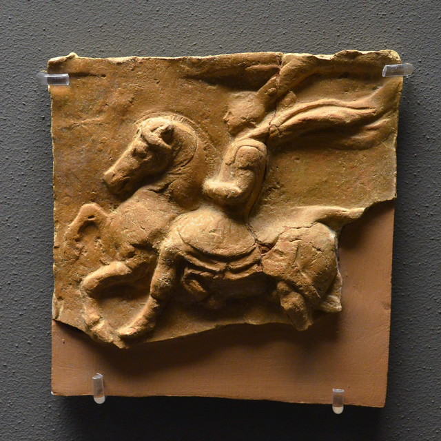 Terracotta votive plaque with representation of a horseman in relief, from Antheia