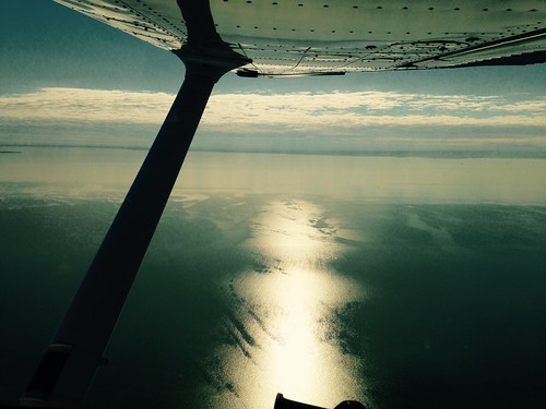 lake reflection water flying inflight lakeerie michigan aviation wing aerial shore cessna 172 generalaviation wingview