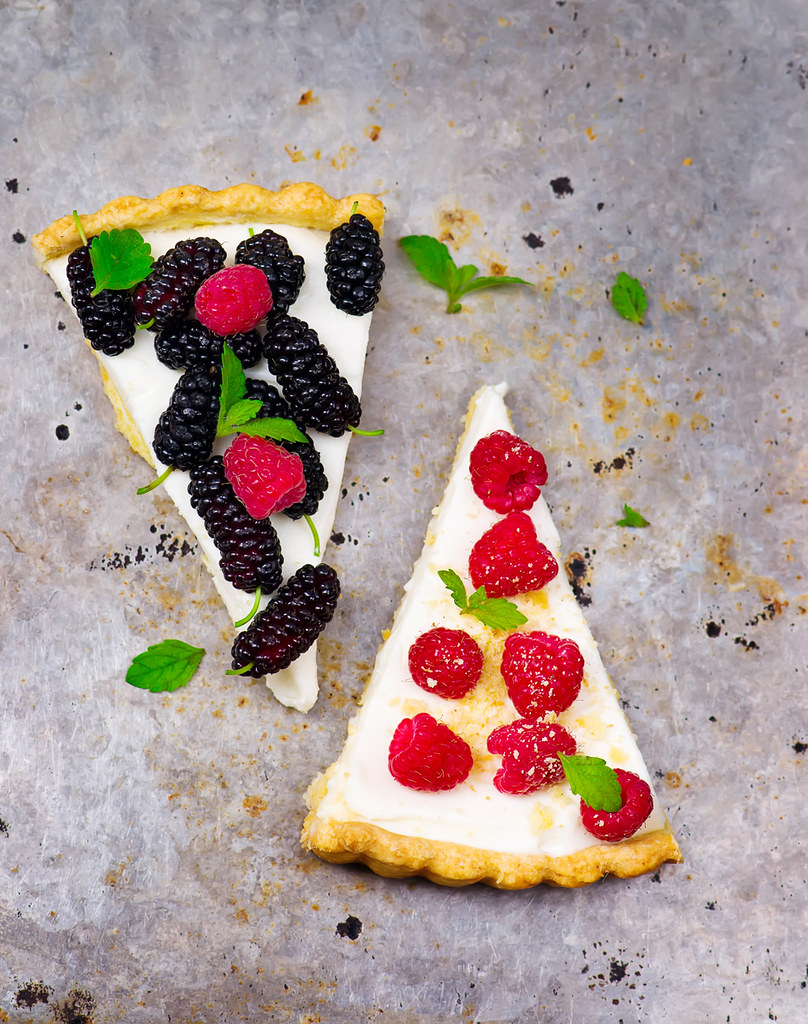 slice of a tart with fresh berries.