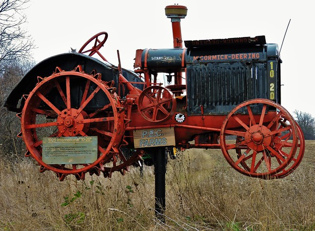 1925 International Tractor, atop a pole in a field