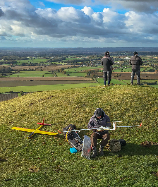 Enthusiasts prepare to fly their model gliders from Roundway Hill near Devizes in Wiltshire