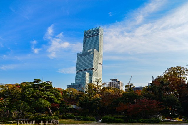 Urban autumn scenery with the Japan's highest building behind in Osaka