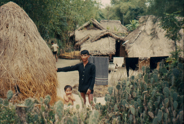 Vietnam 1966 - Huts and locals