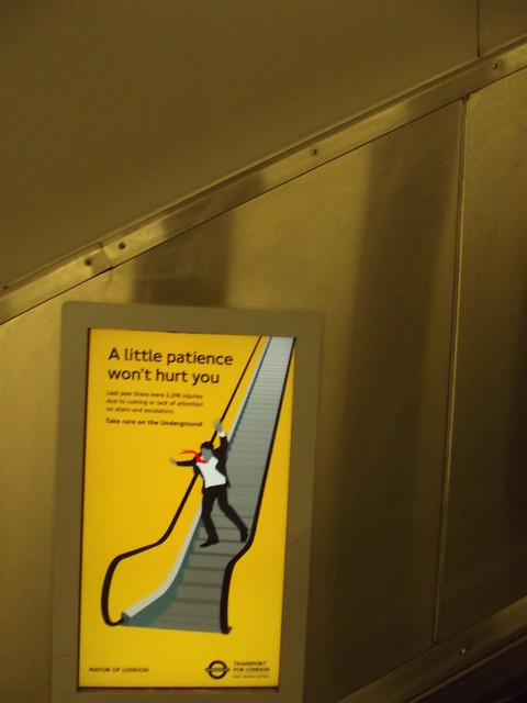 Victoria Underground Station - digital advert - A little patience won't hurt you