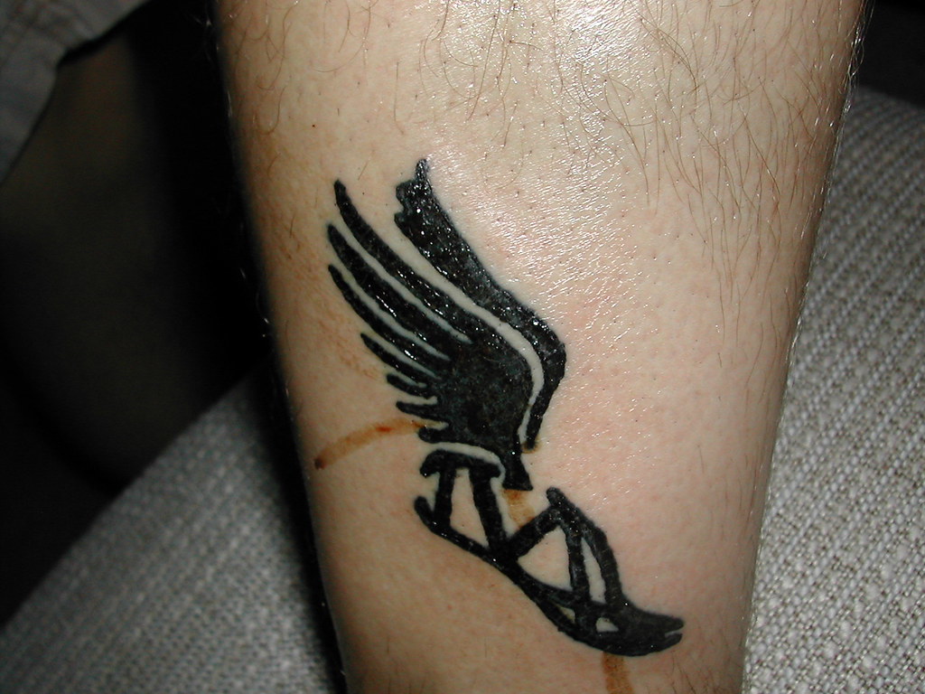 Pin by MakingEverythingGrand on Runner's Tattoos | Running tattoo, Foot  tattoos, Runner tattoo