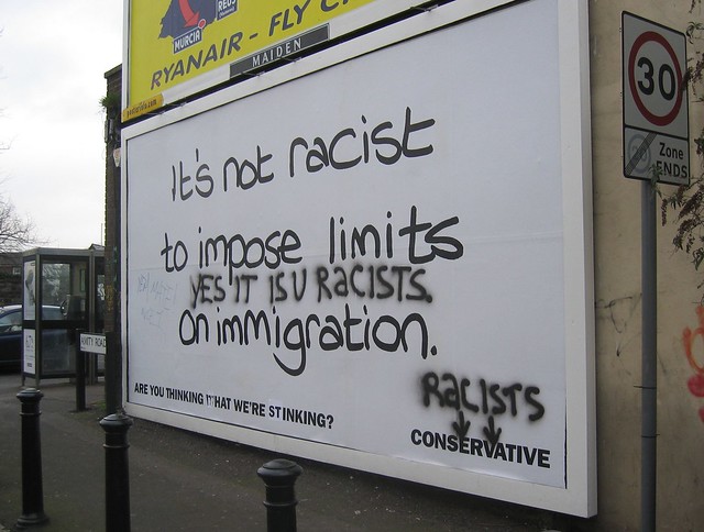 Graffiti artists hack Conservative party billboard