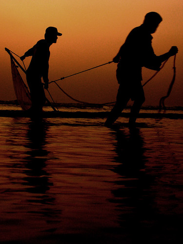 sunset karachi pakistan oasis life waves reflection fishing karachiorange alikhurshid