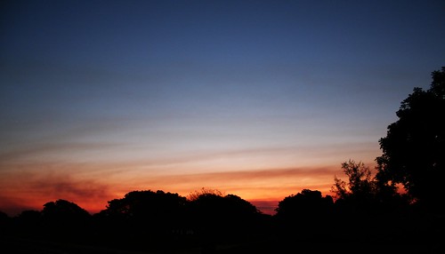 trees sunset silhouette clouds rural colours blues golds reds wispy mozambique xaixai 2011 views50 gazaprovince