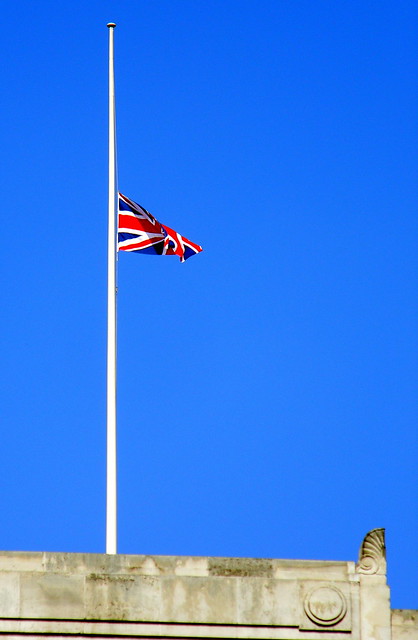 Union Jack flag at half mast Regent Street blue sky 30th July 2011 London England 16:52.45pm