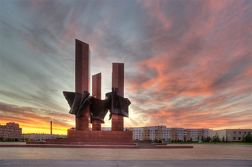 sunset red summer sky sun clouds square memorial russia urengoy