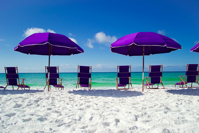 Beach Chairs, Umbrellas, Sand, and Salt Water.