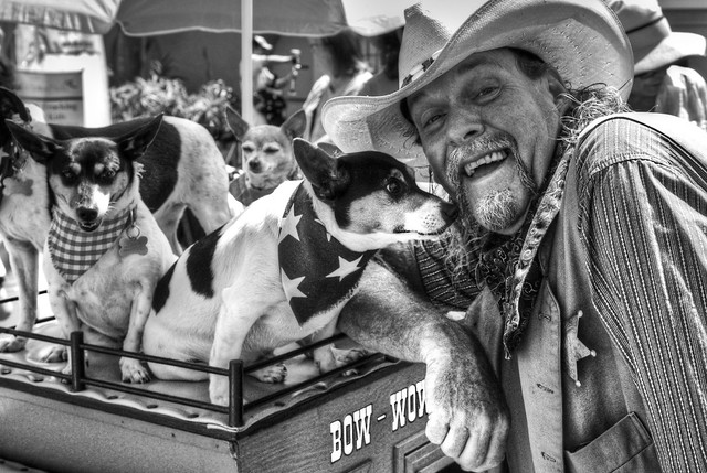 A man (Gary Noel aka Marshal Rowdy ) and his dogs at the Del Mar Fair HDR